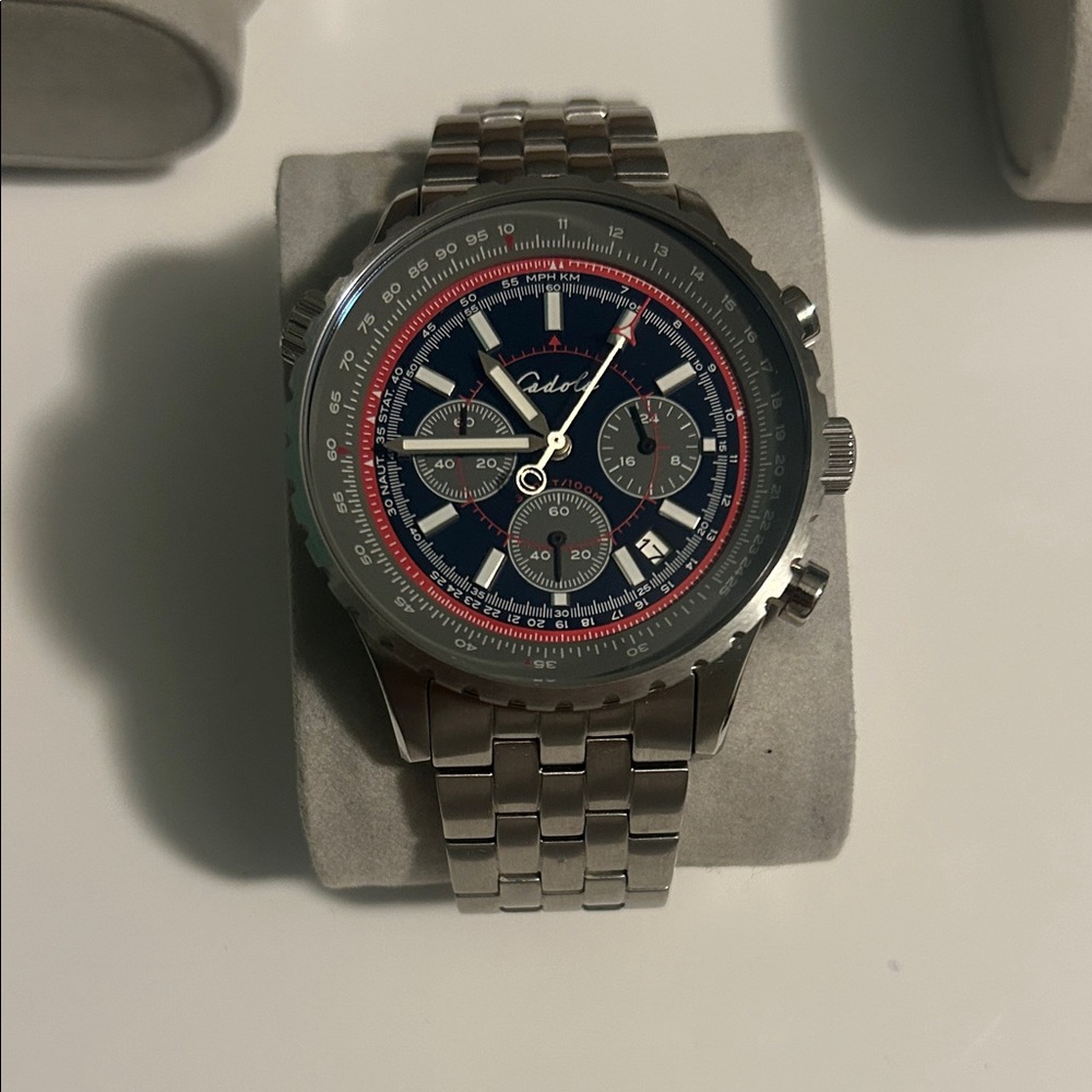 Casio Silver Watch with Blue and Red Dial